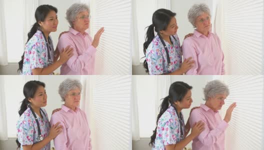 成熟的白人妇女正在安慰日本护士高清在线视频素材下载