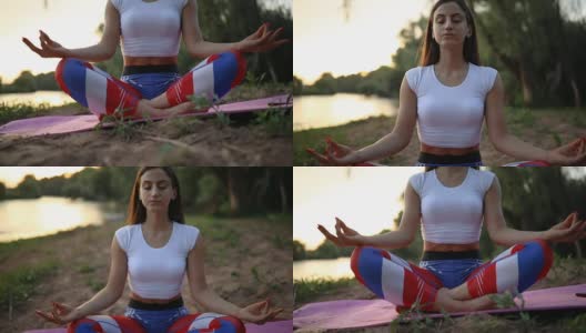 穿着紧身裤的健康女人在森林里做瑜伽高清在线视频素材下载