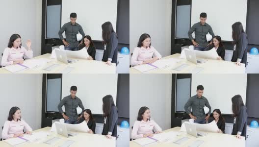 亚洲商人和团体在会议上用笔记本给商业伙伴讨论文件和想法，商务女性在工作中微笑高清在线视频素材下载