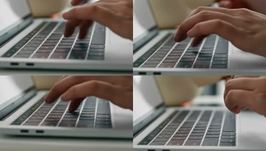 近距离的手打字键盘电脑笔记本在办公室。一个年轻女子只使用台式电脑。高清在线视频素材下载
