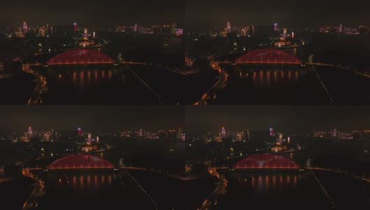 夜光照亮武汉市内著名的交通大桥，江边航拍全景4k中国高清在线视频素材下载