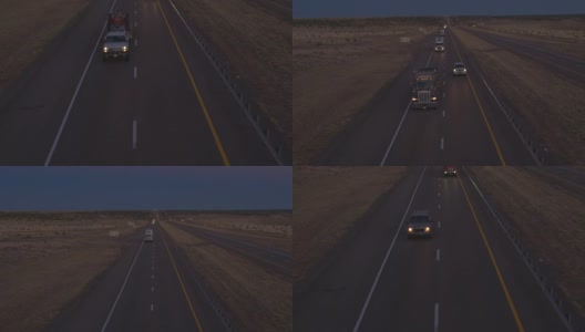 航拍:黄昏时分，公路上货运卡车和汽车的交通高清在线视频素材下载