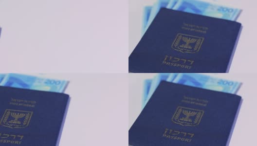 一堆以色列的200谢克尔纸币和以色列护照——潘离开了高清在线视频素材下载