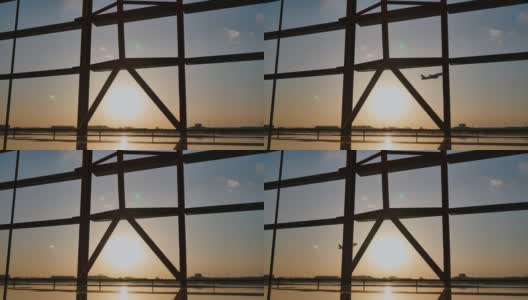 日落时分，一架飞机在北京机场的一扇窗户后面起飞高清在线视频素材下载