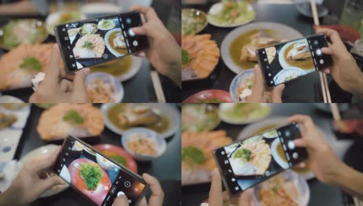 亚洲女性用智能手机拍下日本美食，在社交媒体上分享乐趣和幸福。高清在线视频素材下载