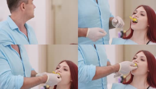 正牙医生将一个装有硅胶材料的勺子放入病人的嘴里，以给她的牙齿做一个印模高清在线视频素材下载