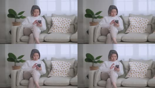 老年女性使用电话高清在线视频素材下载