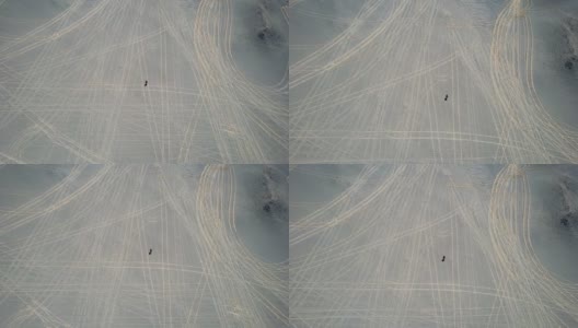 鸟瞰图的人和轮胎痕迹/青海，中国高清在线视频素材下载