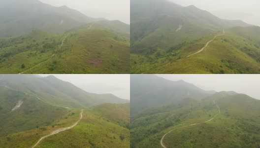 沿着山间的徒步小径飞行。灵汇山，香港大屿山郊野公园高清在线视频素材下载