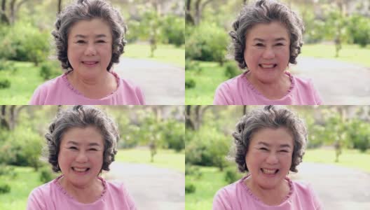 亚洲资深女性的肖像。高级写真，快乐的老奶奶微笑着看着镜头高清在线视频素材下载