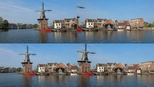 哈莱姆地标风车德阿德里安在斯帕讷河。哈莱姆,荷兰高清在线视频素材下载