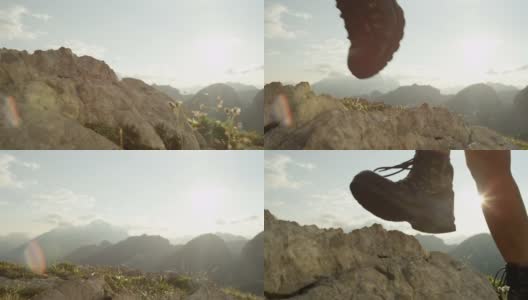 近距离观察:女人徒步岩石山在舒适的新登山靴高清在线视频素材下载