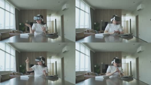 女性商务会议会议VR虚拟现实元宇宙数字世界技术AR增强现实控制演示在家工作高清在线视频素材下载