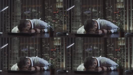 疲惫的男人睡在办公室里高清在线视频素材下载