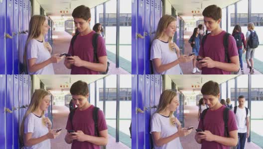 两个十几岁的朋友在学校走廊里打电话高清在线视频素材下载