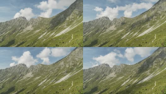 在奥地利阿尔卑斯山斜坡上的夏季云景，Hafelekarspitze-Seegrube在karwendell山，奥地利因斯布鲁克高清在线视频素材下载