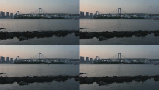 东京城市天际线和东京湾，彩虹桥日落高清在线视频素材下载