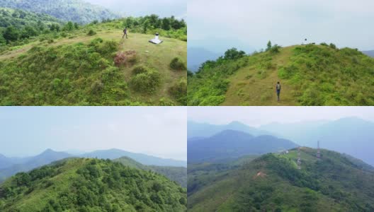 一名男子正走向香港西贡的一座山峰高清在线视频素材下载