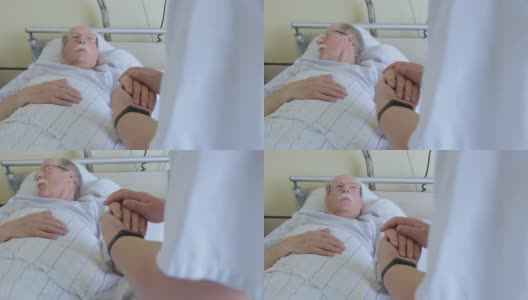 住院男子躺在床上，护士正在安慰他高清在线视频素材下载