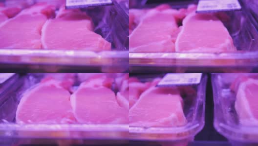 超市里塑料盒子里的生肉特写高清在线视频素材下载