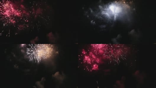五颜六色的烟花在海边的夜空中爆炸高清在线视频素材下载