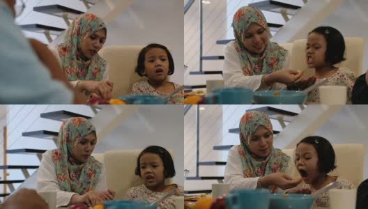 年轻的马来西亚女孩吃一些米饭高清在线视频素材下载