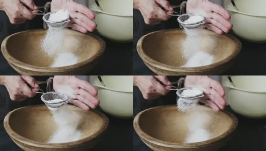 女人们用手在碗里筛面粉。高清在线视频素材下载