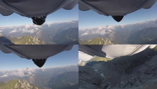 翼装飞行员从悬崖边跳下高清在线视频素材下载
