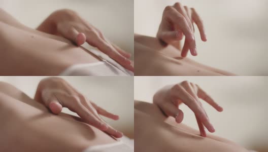 女人的腹部触摸她的腹部皮肤高清在线视频素材下载