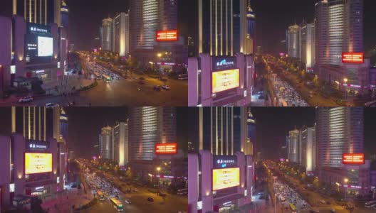 夜间照明青岛市市中心街道十字路口航拍4k中国全景图高清在线视频素材下载