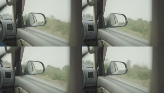 一个女人开车的后视图。高清在线视频素材下载
