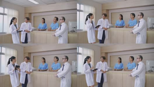 亚洲医生在医院里进行讨论。高清在线视频素材下载