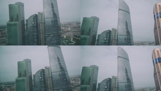 城市商业中心的高层建筑。由玻璃和金属建造的建筑物。从对面的大楼拍摄高清在线视频素材下载