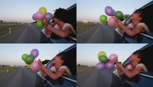 在车上玩气球高清在线视频素材下载
