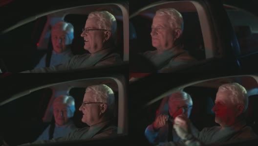 高清多莉:相爱的老年夫妇在晚上开车高清在线视频素材下载