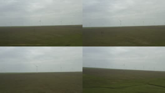 用于能源生产的强大风力涡轮机农场的鸟瞰图。风力涡轮机为可持续发展提供清洁的可再生能源。替代能源。4 k高清在线视频素材下载
