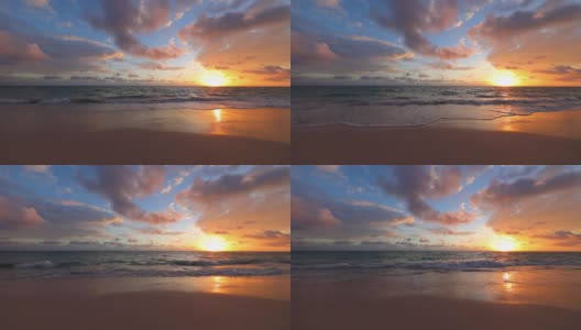 太阳从地平线升起。海浪上戏剧性的日出高清在线视频素材下载