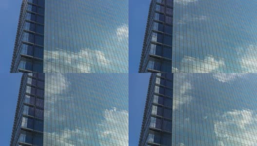 现代城市中城区现代建筑的玻璃墙时光流逝高清在线视频素材下载