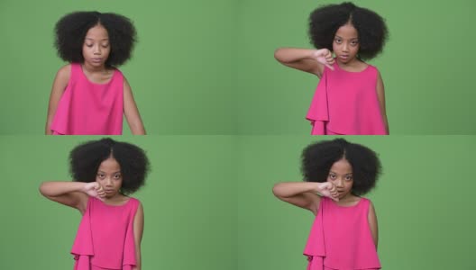 年轻可爱的非洲女孩，有着非洲式的头发，对我指手画脚高清在线视频素材下载