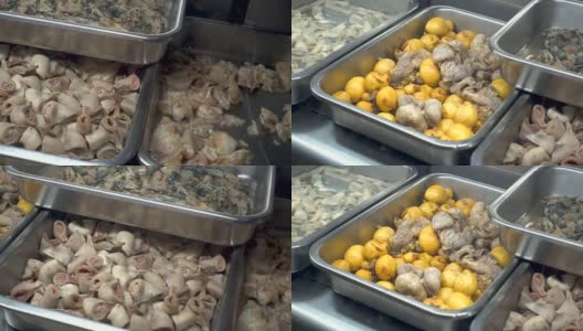 泰国街头小吃店展示动物肠子。高清在线视频素材下载
