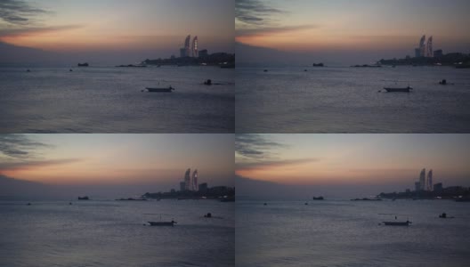 日落时海滨城市的天际线高清在线视频素材下载