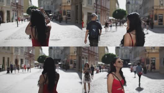 美丽的女孩走在街上-慢镜头高清在线视频素材下载