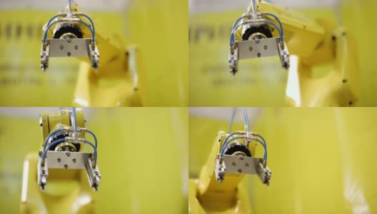 工业机器人手臂活跃于工厂高清在线视频素材下载