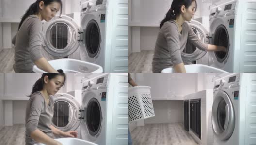 亚洲女人用洗衣机洗衣服高清在线视频素材下载