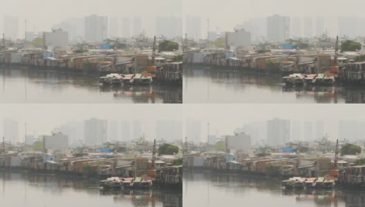 从河边看这个城市的贫民窟高清在线视频素材下载