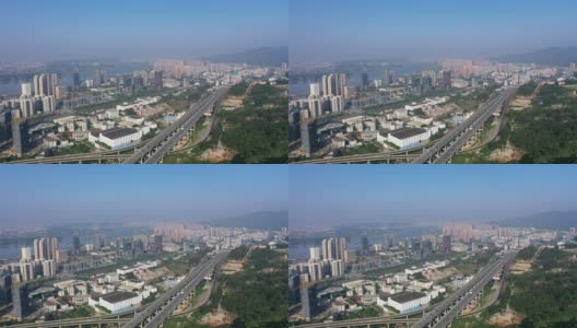 从无人机的角度看城市的多车道公路高清在线视频素材下载