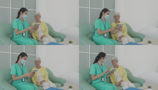 亚洲护士在家客厅用平板电脑对老年患者进行咨询和跟踪护理，在进行家庭保健时在家与医生进行健康咨询和医疗报告。高清在线视频素材下载