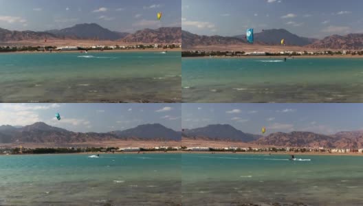 西奈南部达哈卜山景前的风筝滑板高清在线视频素材下载