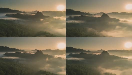 鸟瞰图的雾滚过流动在泰国北部的雨林山，Hyper lapse高清在线视频素材下载