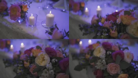 婚礼上的大桌子，有食物，鲜花和蜡烛高清在线视频素材下载